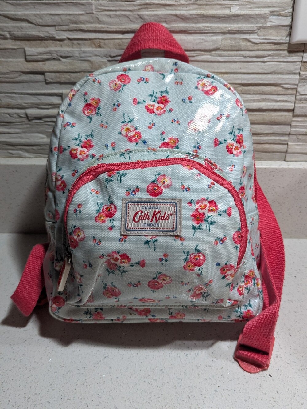 Cath Kidston Kids mini backpack with a delicate pink floral print.